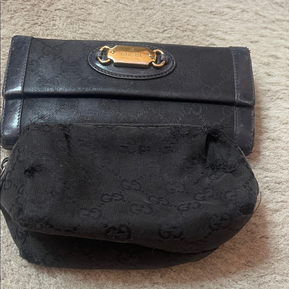 Gucci Black wallet with Gold Accents